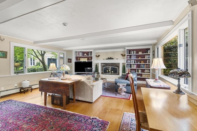 104 Main St, Topsfield, MA 01983 - living room featuring beamed ceiling, wood finished floors, and a glass covered fireplace