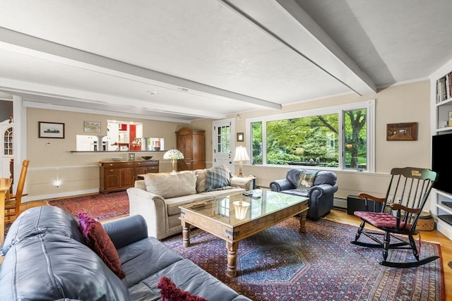 104 Main St, Topsfield, MA 01983 - living area with wood finished floors, beam ceiling, and a baseboard radiator