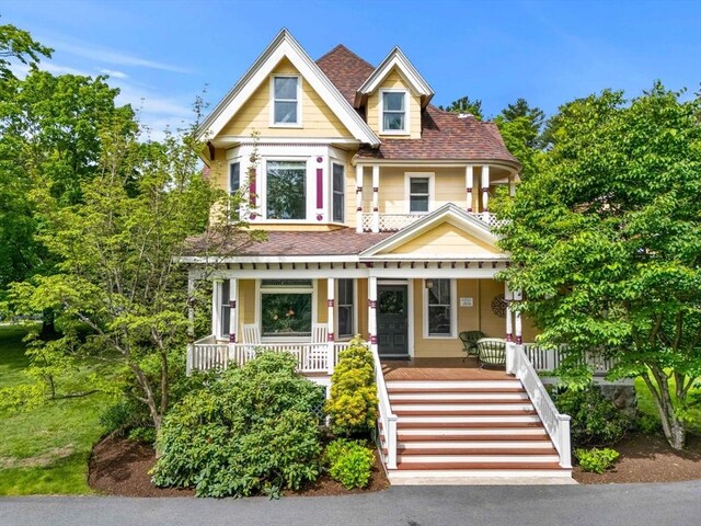 104 Main St, Topsfield, MA 01983 - victorian house with a porch, stairs, and a shingled roof