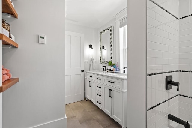 full bath featuring double vanity and a sink