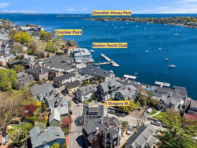 aerial view featuring a water view and a residential view