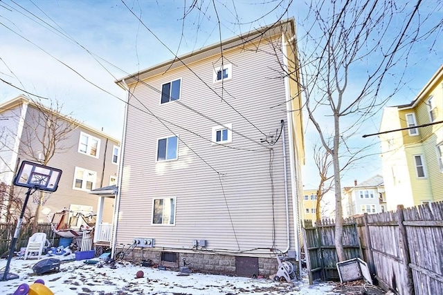 view of snow covered house