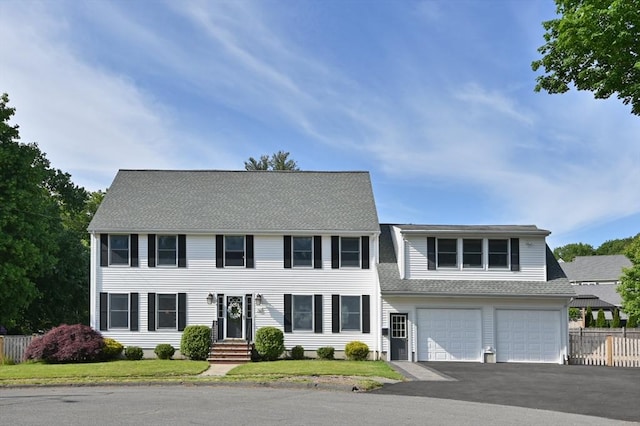 32 Iverson Rd, Beverly, MA 01915 - view of front of home featuring driveway, an attached garage, and roof with shingles