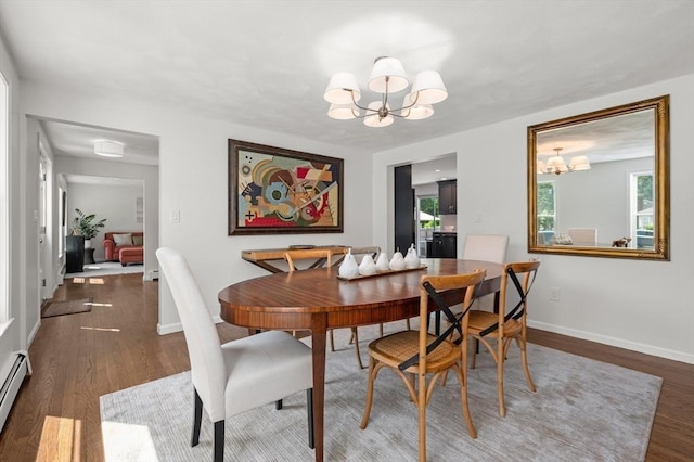 32 Iverson Rd, Beverly, MA 01915 - dining room featuring a chandelier, wood finished floors, a baseboard radiator, and baseboards
