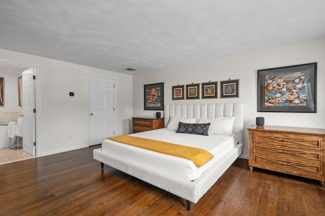 32 Iverson Rd, Beverly, MA 01915 - bedroom with wood finished floors, baseboards, and ensuite bathroom