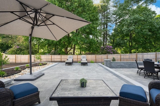 32 Iverson Rd, Beverly, MA 01915 - fenced backyard featuring outdoor dining space and a patio area