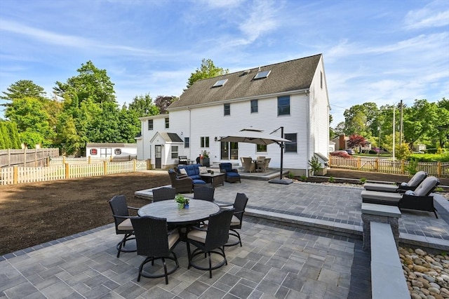 32 Iverson Rd, Beverly, MA 01915 - back of house featuring outdoor dining area and a patio area