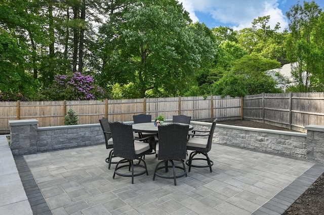 32 Iverson Rd, Beverly, MA 01915 - fenced backyard with a patio area and outdoor dining space