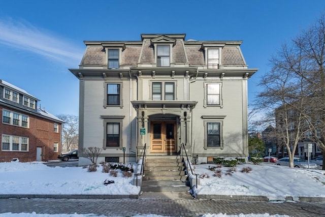 37 Mellen St, Cambridge, MA 02138 - victorian home featuring mansard roof and french doors