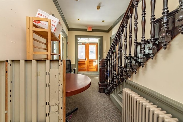 37 Mellen St, Cambridge, MA 02138 - foyer featuring radiator, ornamental molding, and carpet flooring