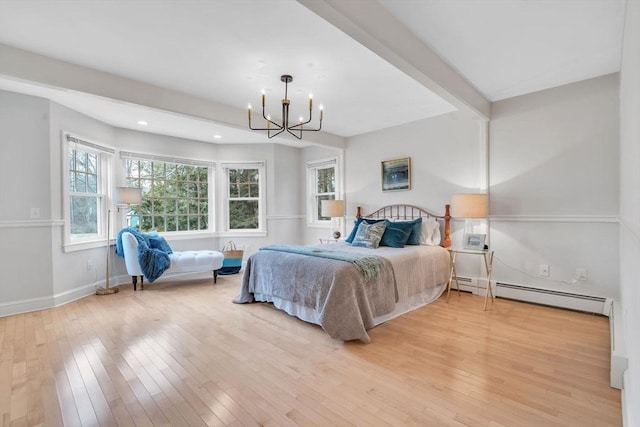 bedroom with beam ceiling, light wood-style flooring, an inviting chandelier, a baseboard radiator, and baseboards