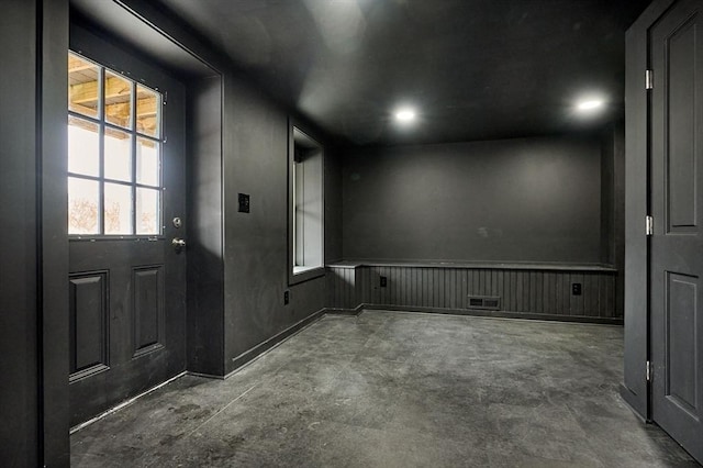 entrance foyer with recessed lighting, visible vents, and concrete floors