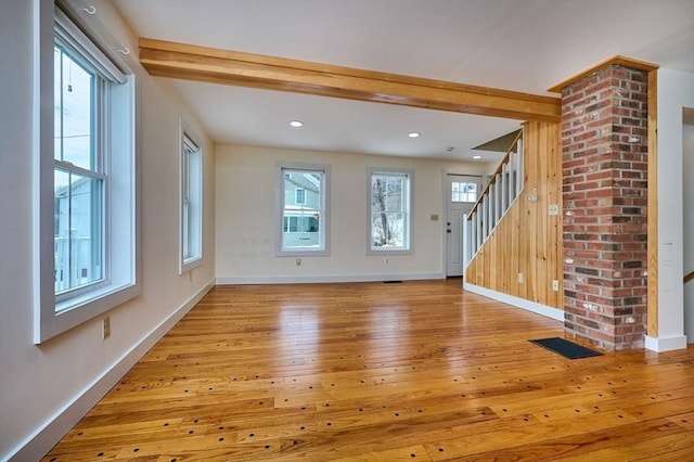 interior space featuring recessed lighting, stairway, baseboards, and light wood-style flooring