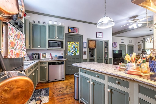 52 Central, Gardner, MA 01440 - kitchen with appliances with stainless steel finishes, crown molding, a ceiling fan, dark wood-style flooring, and decorative light fixtures