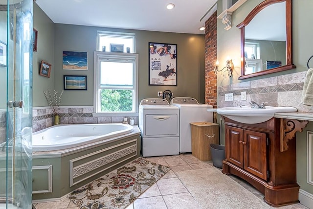 52 Central, Gardner, MA 01440 - bathroom with independent washer and dryer, vanity, a garden tub, a stall shower, and recessed lighting