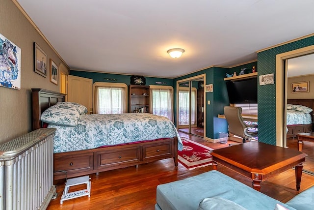 52 Central, Gardner, MA 01440 - bedroom with dark wood finished floors, ornamental molding, and wallpapered walls