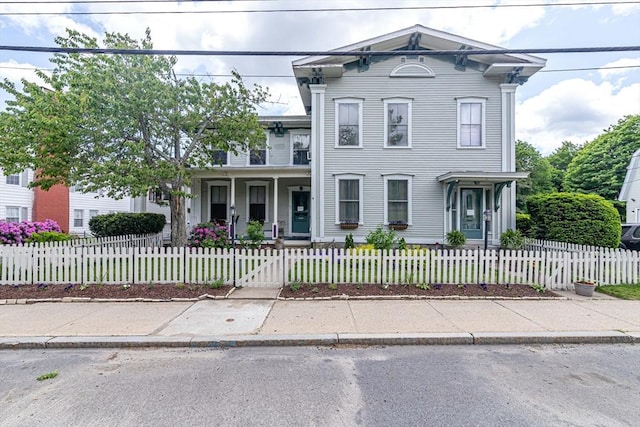52 Central, Gardner, MA 01440 - italianate house with a porch and a fenced front yard