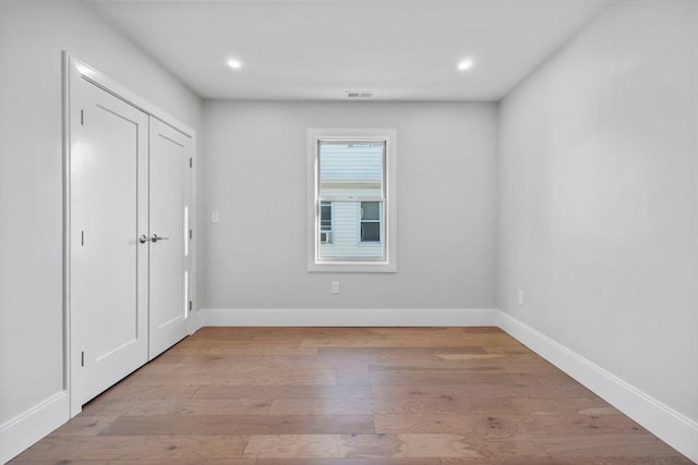 empty room featuring light hardwood / wood-style floors