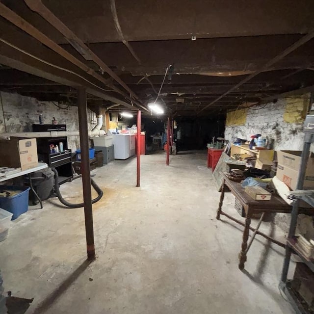 basement with separate washer and dryer