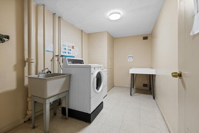 100 Park Terrace Dr Unit 124, Stoneham, MA 02180 - community laundry with independent washer and dryer and baseboards