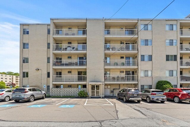 100 Park Terrace Dr Unit 124, Stoneham, MA 02180 - view of apartment building / complex with uncovered parking