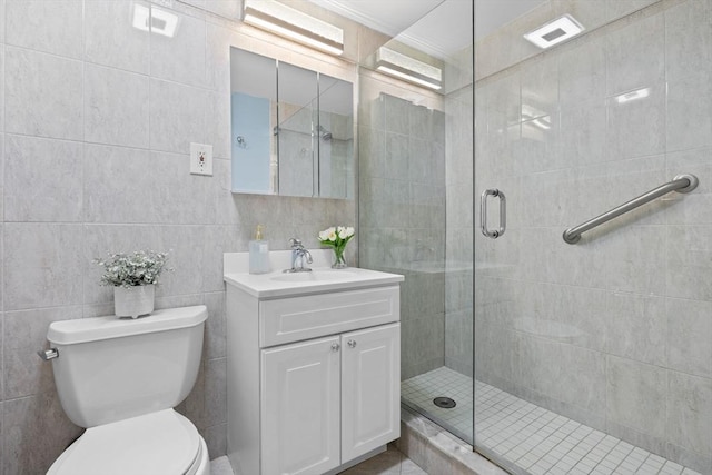100 Park Terrace Dr Unit 124, Stoneham, MA 02180 - full bath with vanity, toilet, a shower stall, and tile walls
