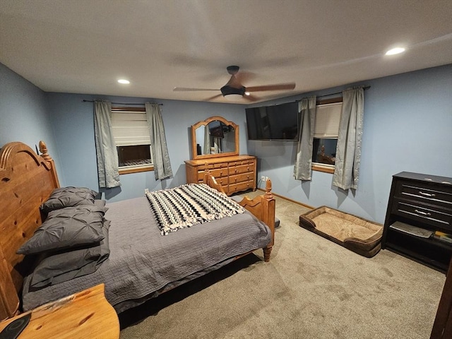 bedroom with ceiling fan and carpet