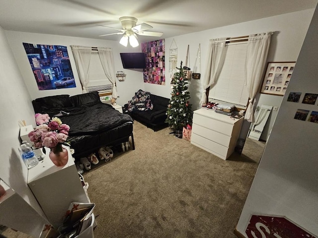 bedroom featuring ceiling fan and carpet flooring