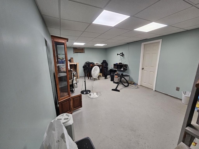 exercise area with a paneled ceiling