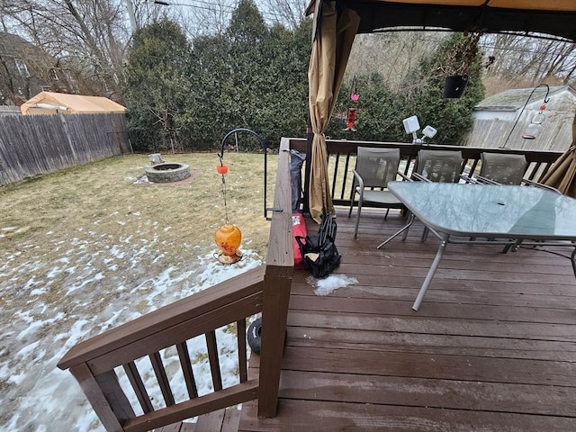 deck with an outdoor fire pit