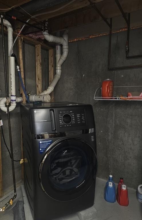 laundry room featuring washer / dryer