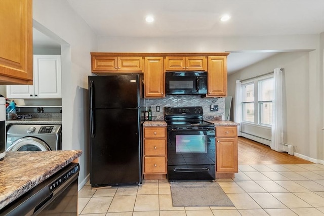 63 Beverly St, Chicopee, MA 01013 - kitchen featuring black appliances, washer / dryer, light countertops, backsplash, and baseboard heating