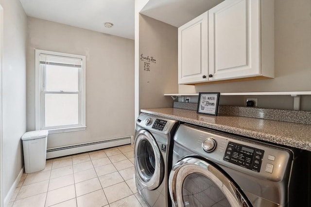 63 Beverly St, Chicopee, MA 01013 - laundry area featuring a baseboard heating unit, cabinet space, separate washer and dryer, and light tile patterned flooring