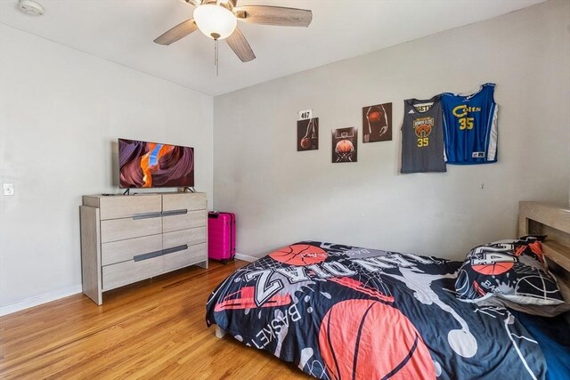 63 Beverly St, Chicopee, MA 01013 - bedroom featuring wood finished floors, ceiling fan, and baseboards