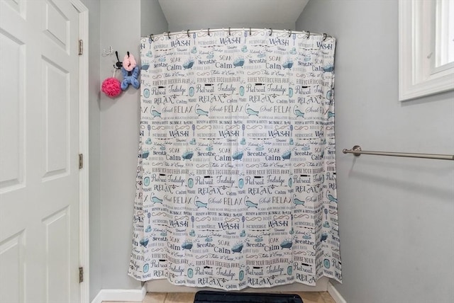 63 Beverly St, Chicopee, MA 01013 - full bathroom with baseboards and a shower with curtain
