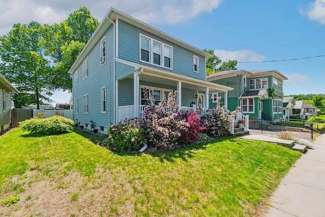 63 Beverly St, Chicopee, MA 01013 - american foursquare style home with a porch