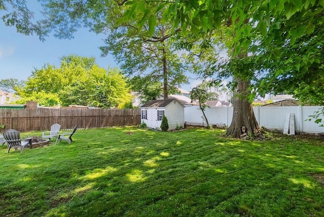 63 Beverly St, Chicopee, MA 01013 - view of yard with an outdoor fire pit