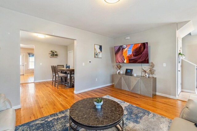 63 Beverly St, Chicopee, MA 01013 - living area featuring wood finished floors and baseboards