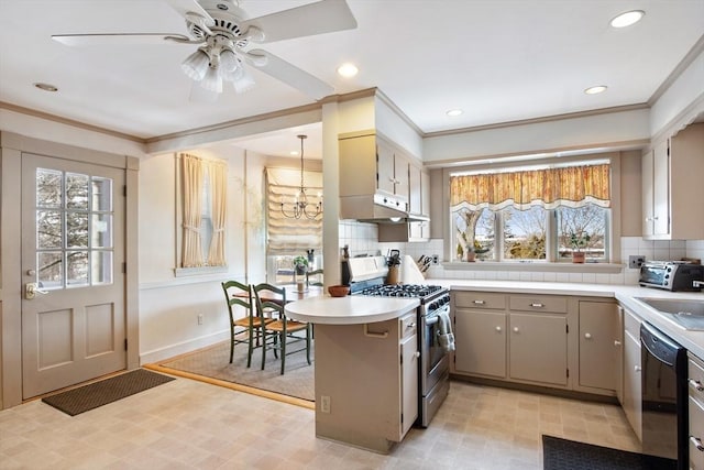 kitchen featuring stainless steel gas stove, dishwasher, a peninsula, light countertops, and under cabinet range hood