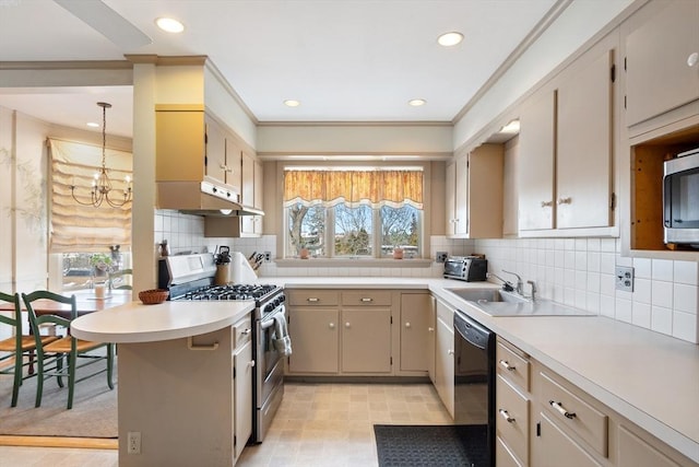 kitchen with a notable chandelier, stainless steel appliances, light countertops, decorative backsplash, and ornamental molding