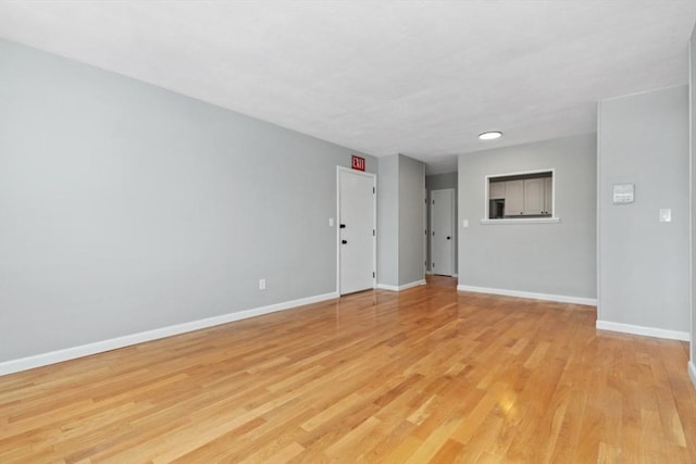 unfurnished room featuring light hardwood / wood-style flooring