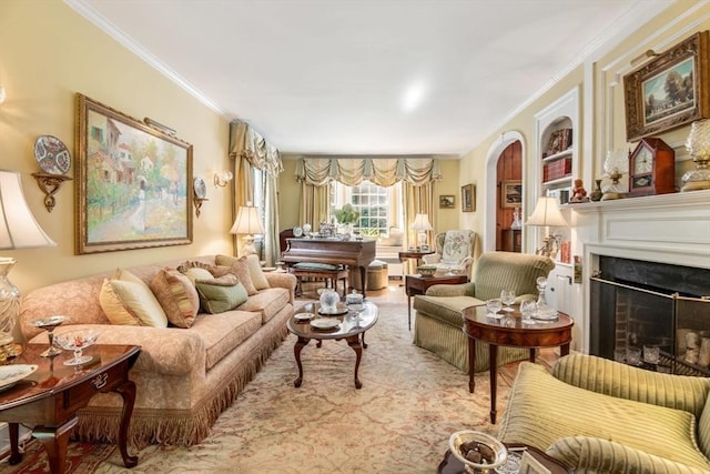 living room featuring built in shelves and ornamental molding