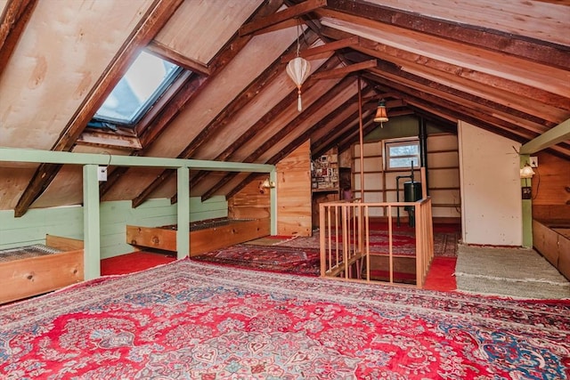 attic featuring plenty of natural light