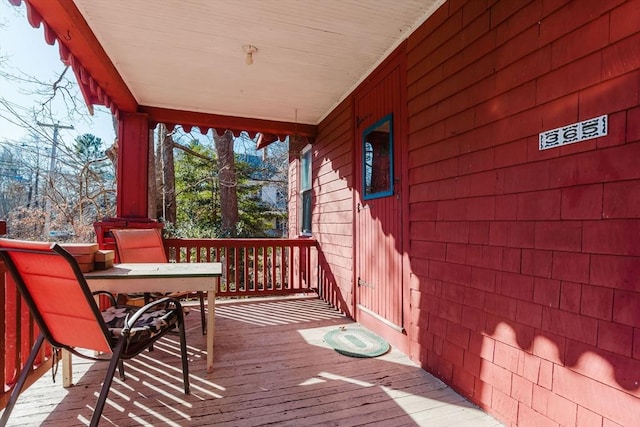 wooden deck with a porch