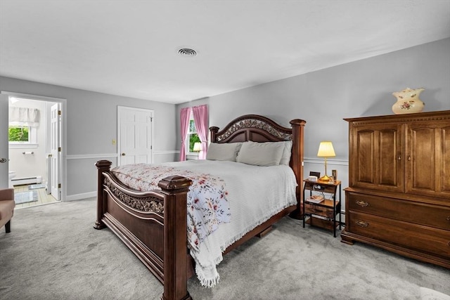 23 Fletcher St, Foxboro, MA 02035 - bedroom with light colored carpet, a baseboard radiator, and multiple windows