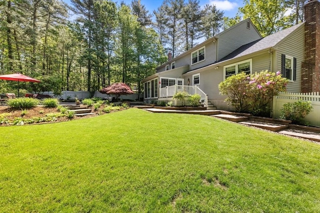 23 Fletcher St, Foxboro, MA 02035 - view of yard featuring a deck and a sunroom