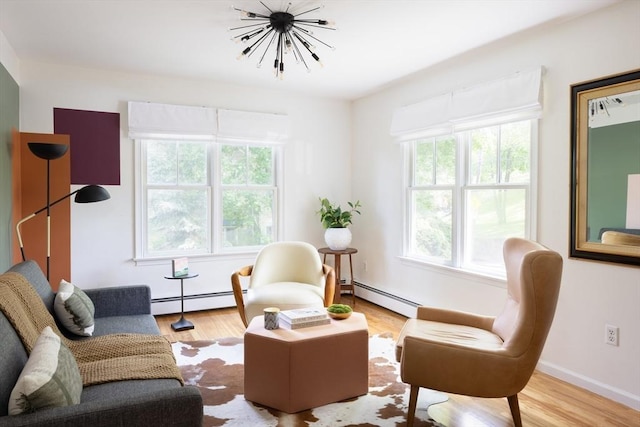 17-19 Beech Gln, Boston, MA 02119 - sitting room featuring a baseboard heating unit, a chandelier, and wood finished floors