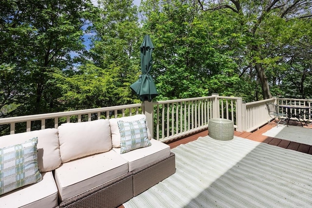 17-19 Beech Gln, Boston, MA 02119 - wooden terrace with an outdoor hangout area and view of wooded area