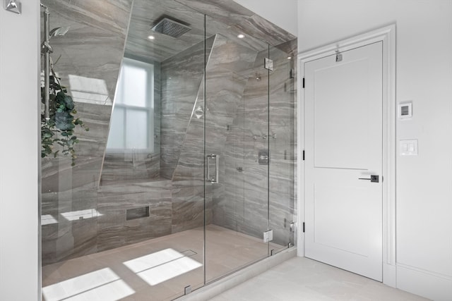 bathroom featuring an enclosed shower