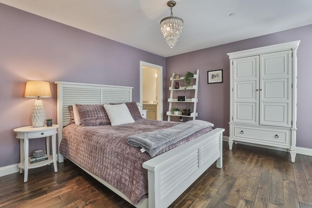 bedroom featuring dark wood-style floors, baseboards, and a chandelier